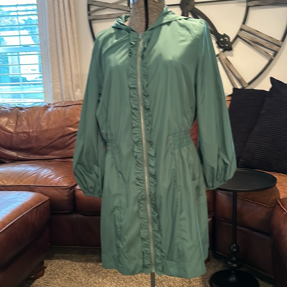 Cinched waist hooded ruffle raincoat